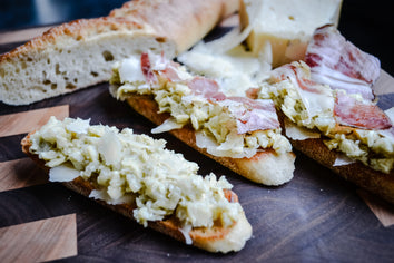 Artichoke Crostini with Parmesan and Proscuitto