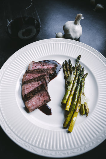 Sous Vide Cabernet Roasted Garlic Strip Steak with Pan Sauce